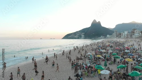 Ipanema people at the beach Rio de Janeiro Brazil photo