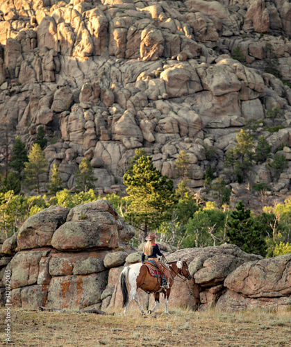 Cowgirl on Paint Horse photo