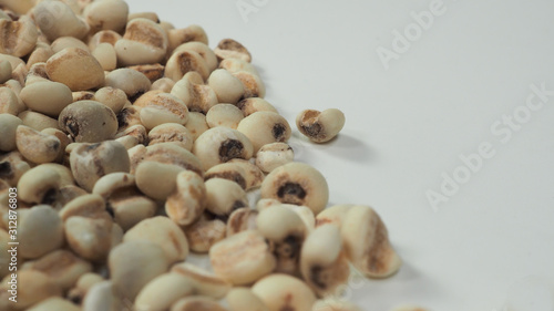 Job's Tears, also known as adlay and coix on calico background. Popular in Asian cultures as a food source.
