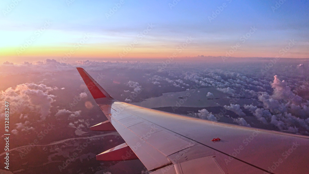 Airplane wings with background landscape sky. Airplane wings with background landscape sky.