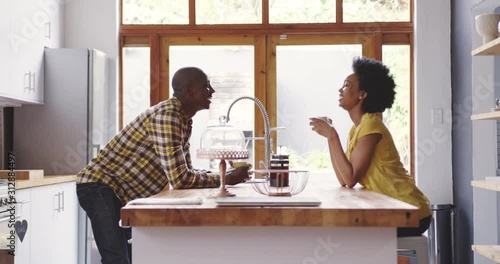 African American woman and man family spending time at home together photo
