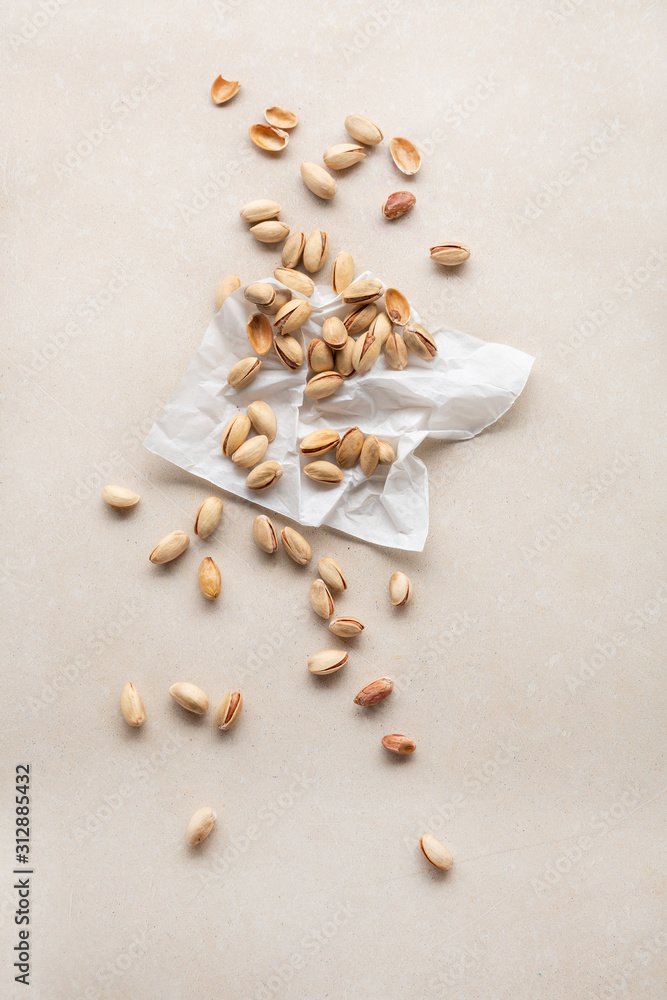 Bunch of pistachio nut on white paper Bunch of pistachio nut on white paper