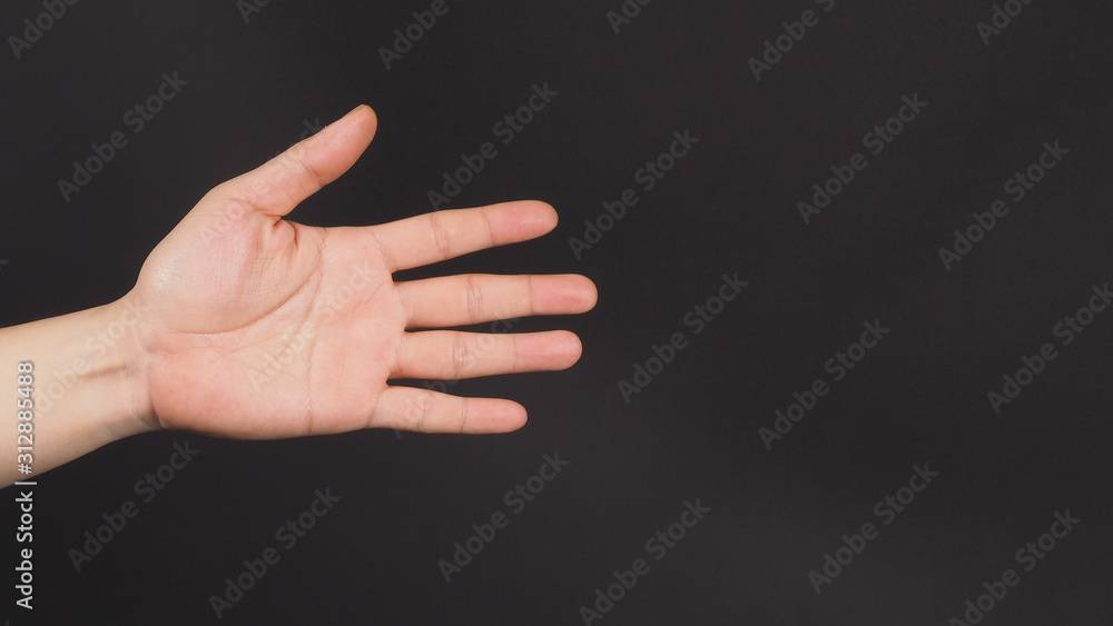 close up of empty left hand palm and Inches apart finger on black background.