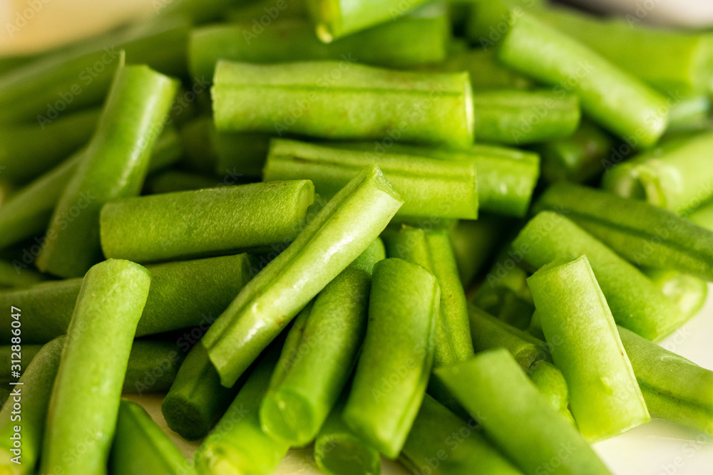 Fototapeta premium Chopped green long beans close up with selective focus on 2nd January 2020
