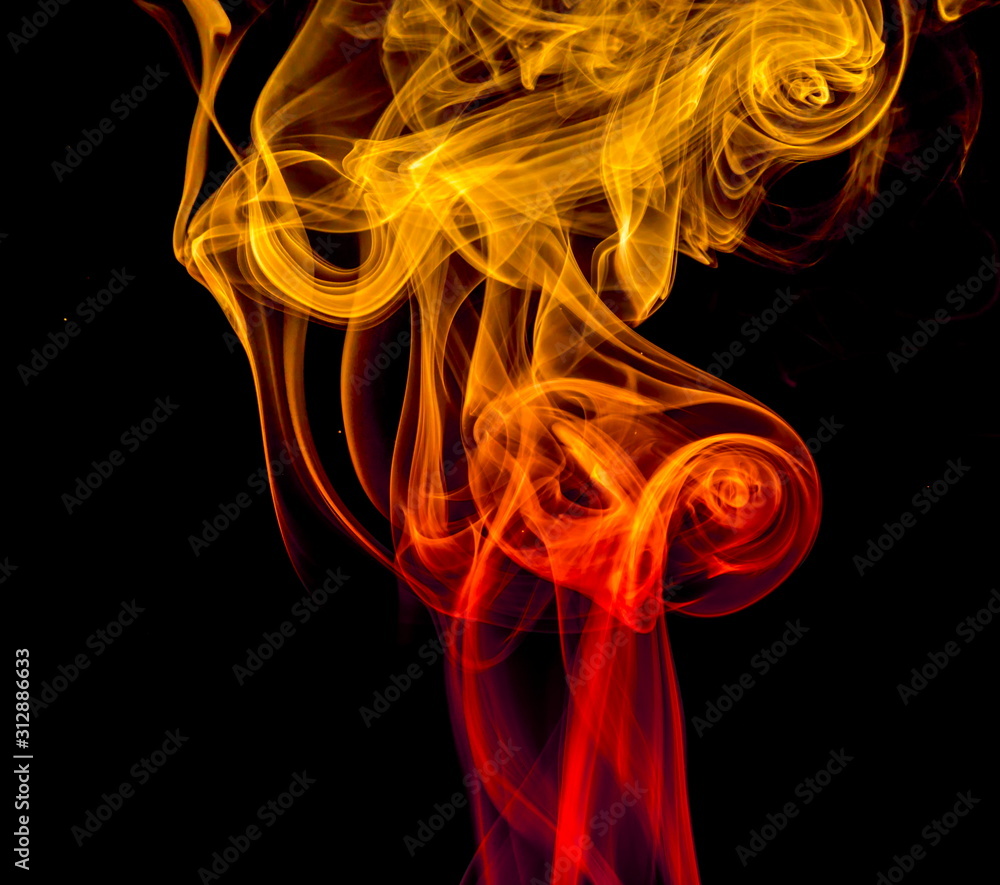 Colored smoke on black background Colored smoke on black background