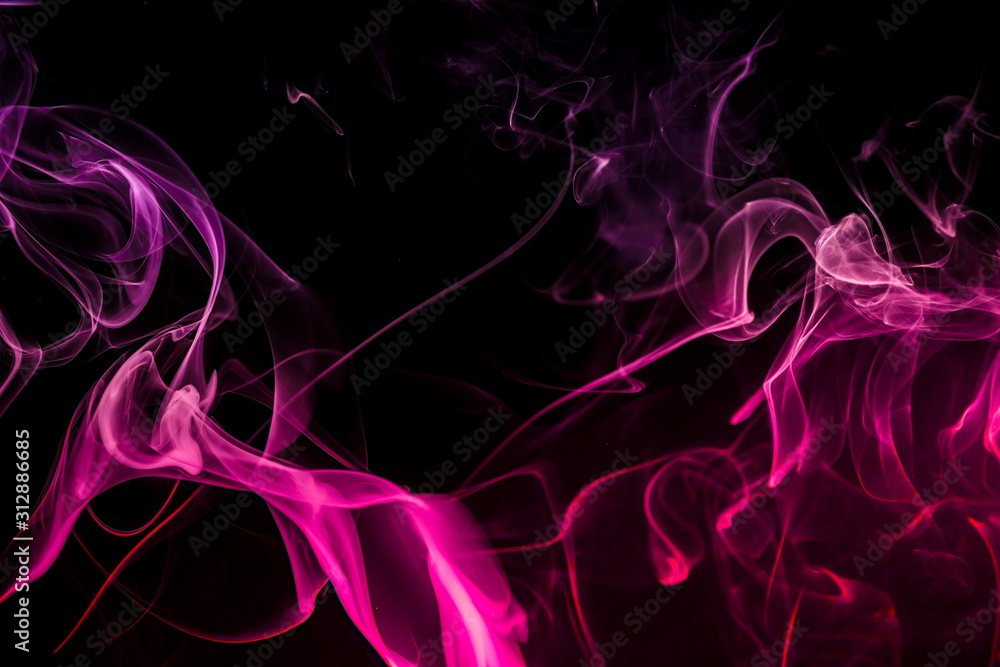 Obraz premium Colored smoke on black background