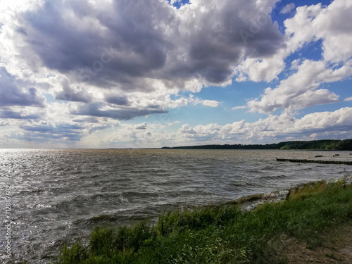 Stettiner Haff mit Wolken Meeresblick photo