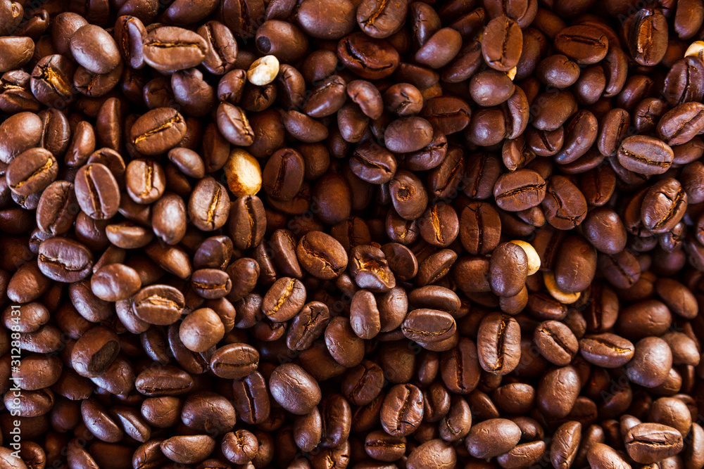 Close-up of brown coffee. coffee bean background. space fill with coffee bean. Close-up of brown coffee. coffee bean background. space fill with coffee bean.