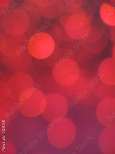 Blurry red lights close up. Abstract background, concept for holiday, party, celebration. Copyspace.