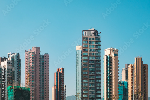 residential skyscraper buildings  skyline and blue sky in Hong Kong -