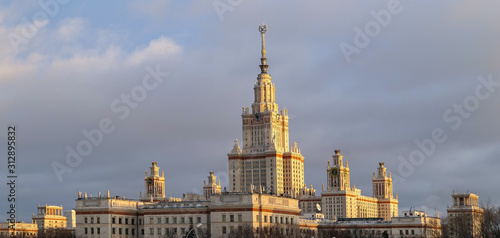 Campus of famous Russian university on background of sunset cloudy sky in Moscow