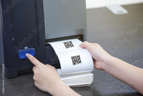 Hand and barcode label printer. Printing Barcode