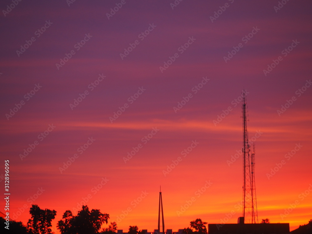 silhouette of tower in sunset