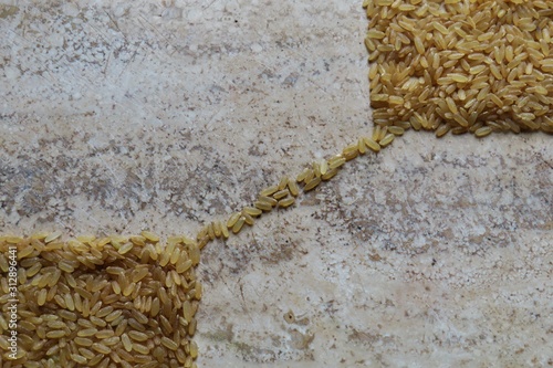 rice on wooden spoon