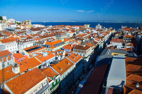 Portugal, panoramic view of old town  Lisbon in summer, touristic centre of Lisbon, St. George's medieval Castle in Lisbon, Lisbon red tile roofs Panoramic view, landscape of Tagus river Lisbon