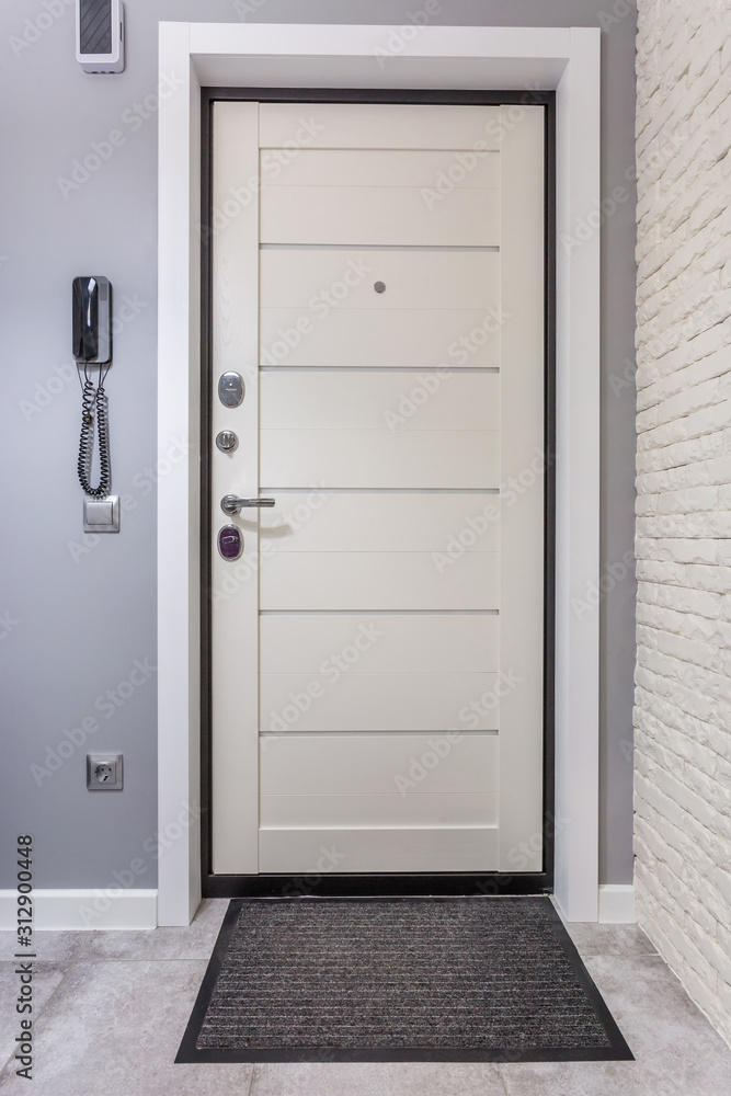 door in modern entrance hall of corridor in expensive apartments door in modern entrance hall of corridor in expensive apartments