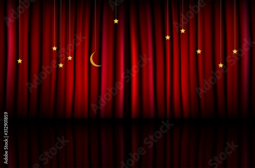 Red curtain with hanging golden stars and moon