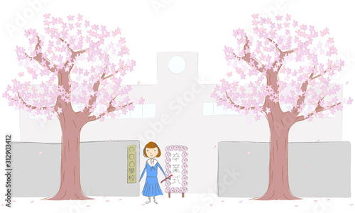 桜の木と学校の正門と女子生徒