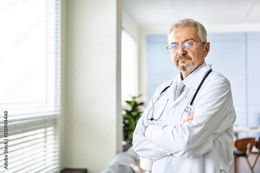 Medical doctor or physician in white gown uniform with stethoscope in hospital or clinic Medical doctor or physician in white gown uniform with stethoscope in hospital or clinic