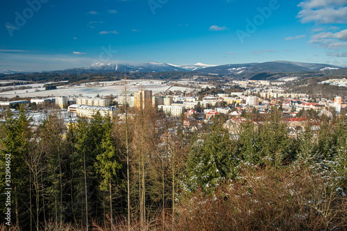 Winter Trutnov with fresh snow and mountains view photo