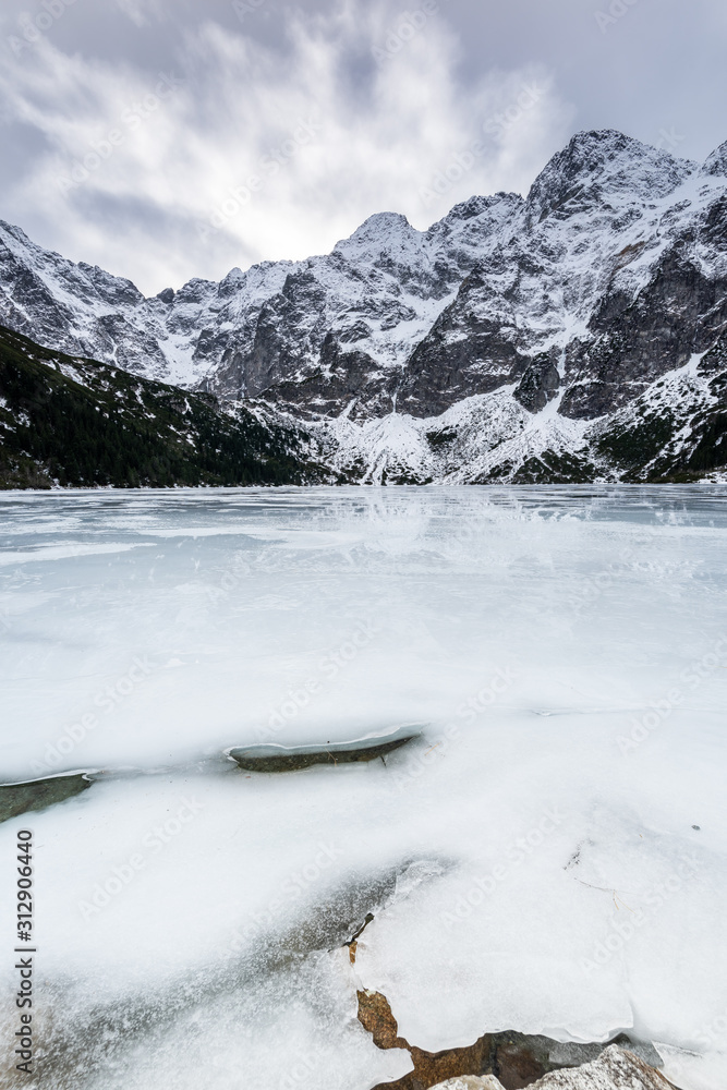 Morskie Oko Lake Covered in Ice at Winter in Tatra Mountains Poland