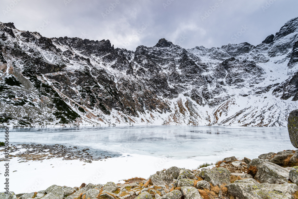 Black Pond or Czarny Staw and Rysy Peak in Tatra Mountains at Winter