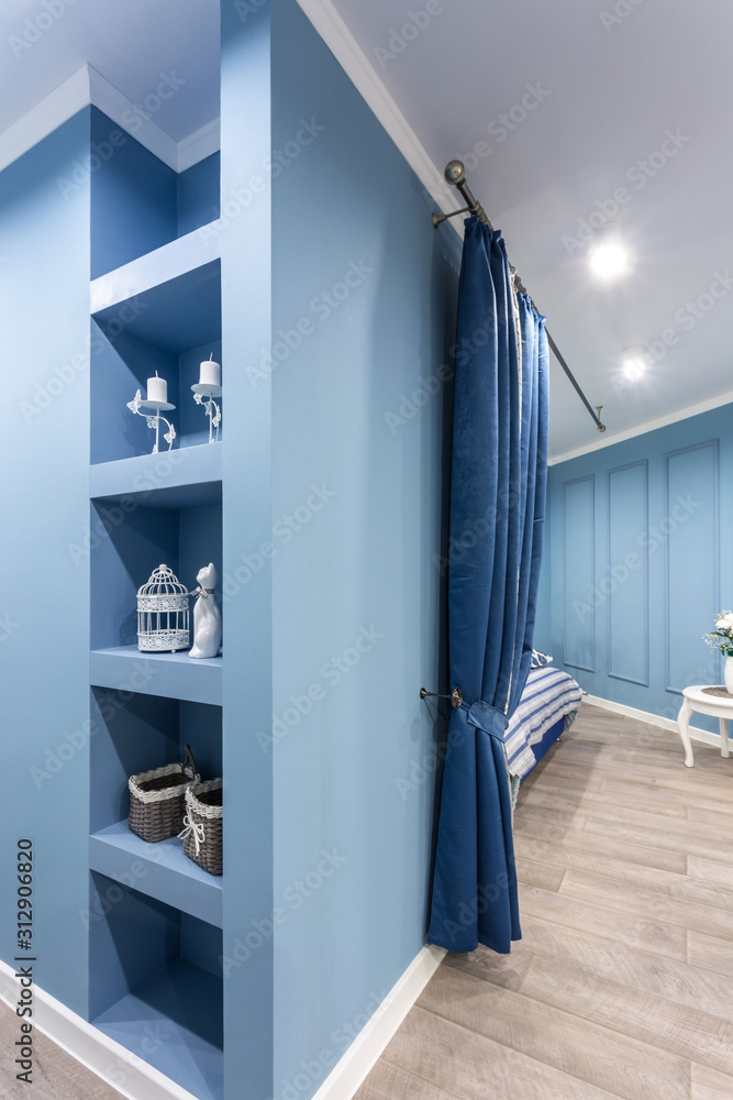 Fototapeta premium modern entrance hall of corridor in blue light color in expensive apartments