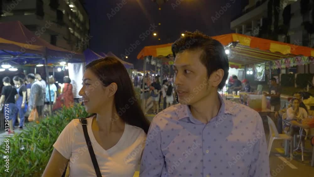Couple's expression In the night market - Forwards Couple's expression In the night market - Forwards