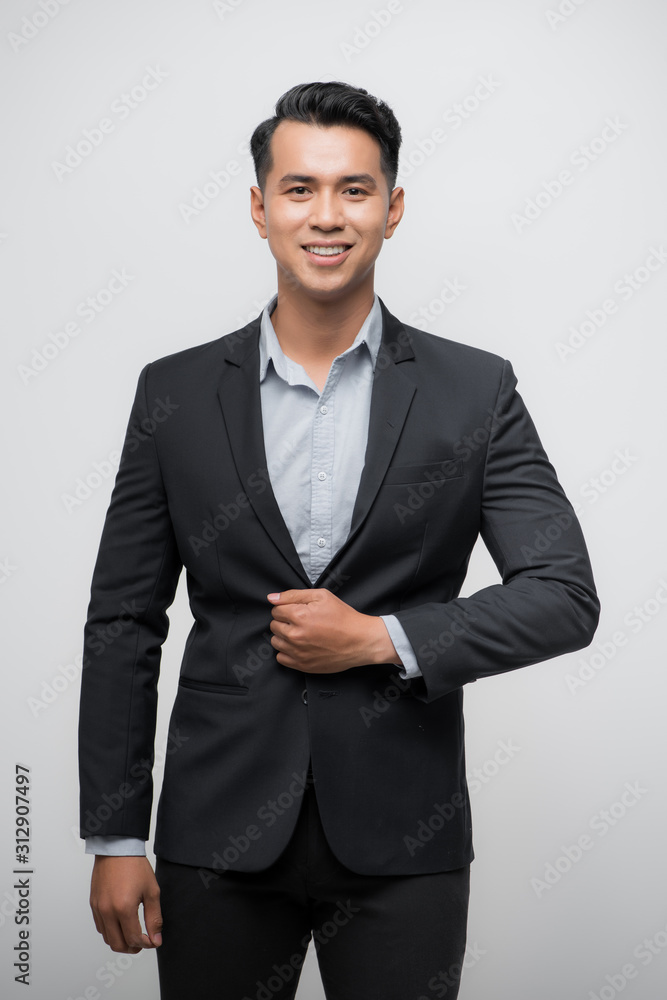 Young Asian business man isolated on white background. Young Asian business man isolated on white background.