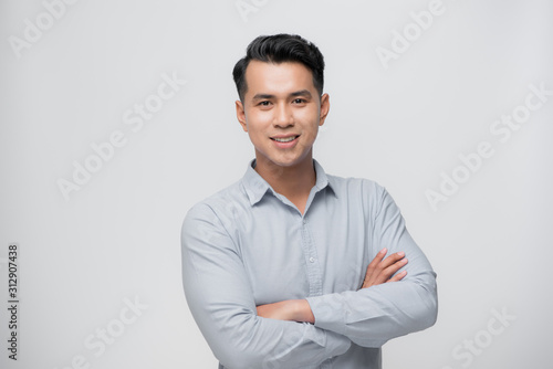 Smart asian business man on white photo