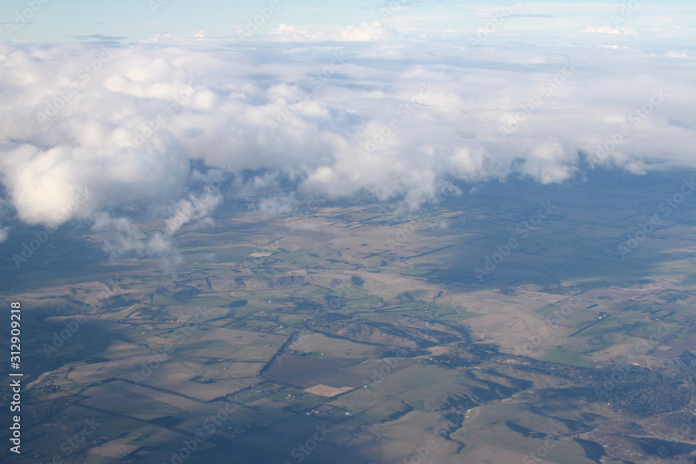 view from airplane window over countryside view from airplane window over countryside