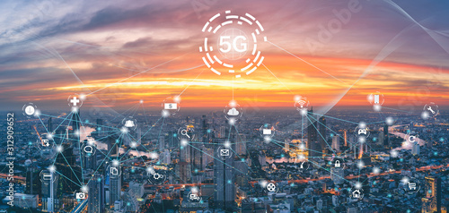 Fototapeta Naklejka Na Ścianę i Meble -  5G network on city background. The wireless communication technology network links work in many branches in smart cities.