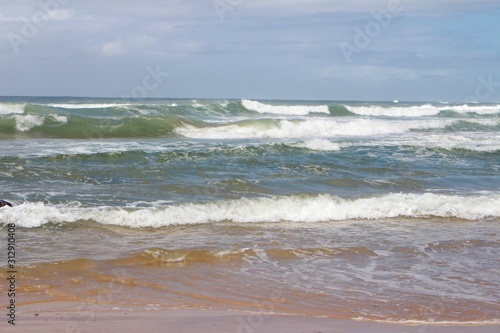 large waves breaking at coffs harbour beach
