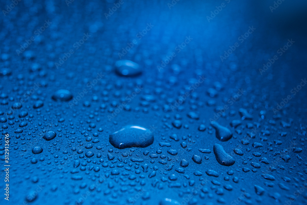water drops on blue background water drops on blue background