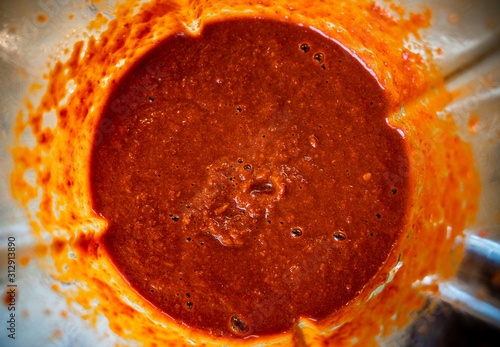 Chocolate Habanero chili pepper (Capsicum chinense) sauce in a blender. Healthy and really hot chili sauce. 