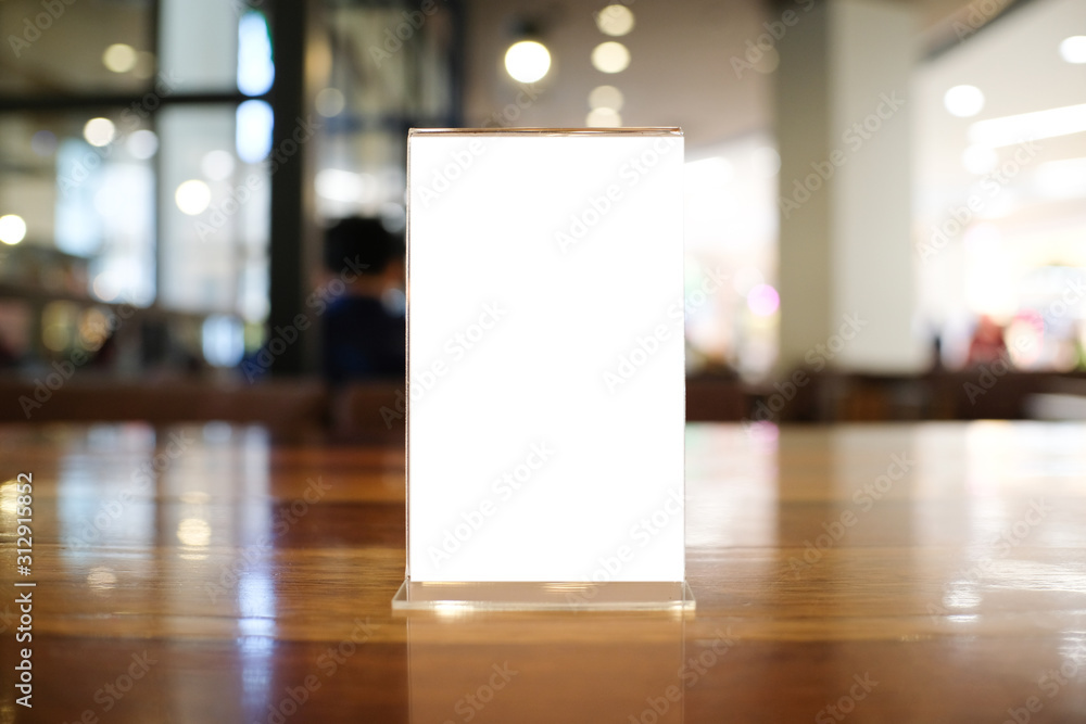 Menu frame space for text marketing promotion standing on wood table in Bar restaurant cafeใ Menu frame space for text marketing promotion standing on wood table in Bar restaurant cafeใ