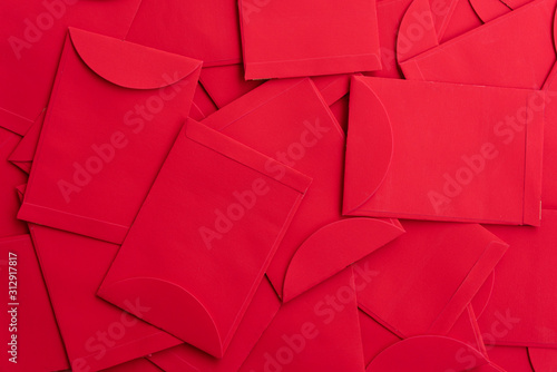 Background of many Chinese New Year red envelopes stacked together