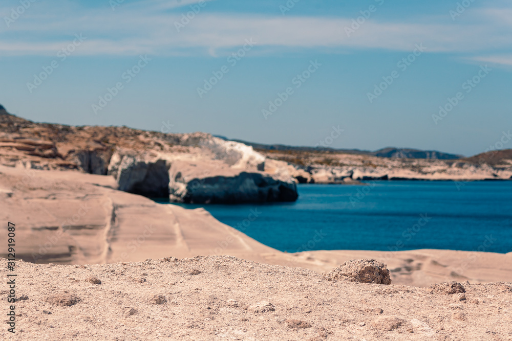 Milos, Greece Sarakiniko Beach and Caves landscape seaside view at cloudy weather