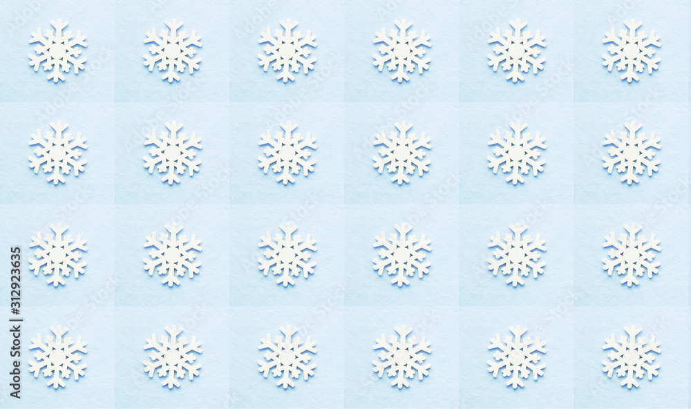 White wooden snowflakes on a gentle blue pale background. Geometric arnaments. Pattern. The background. Screensaver. White wooden snowflakes on a gentle blue pale background. Geometric arnaments. Pattern. The background. Screensaver.