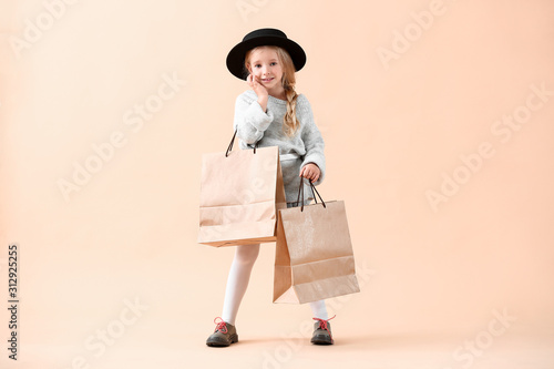 Cute little girl in autumn ...