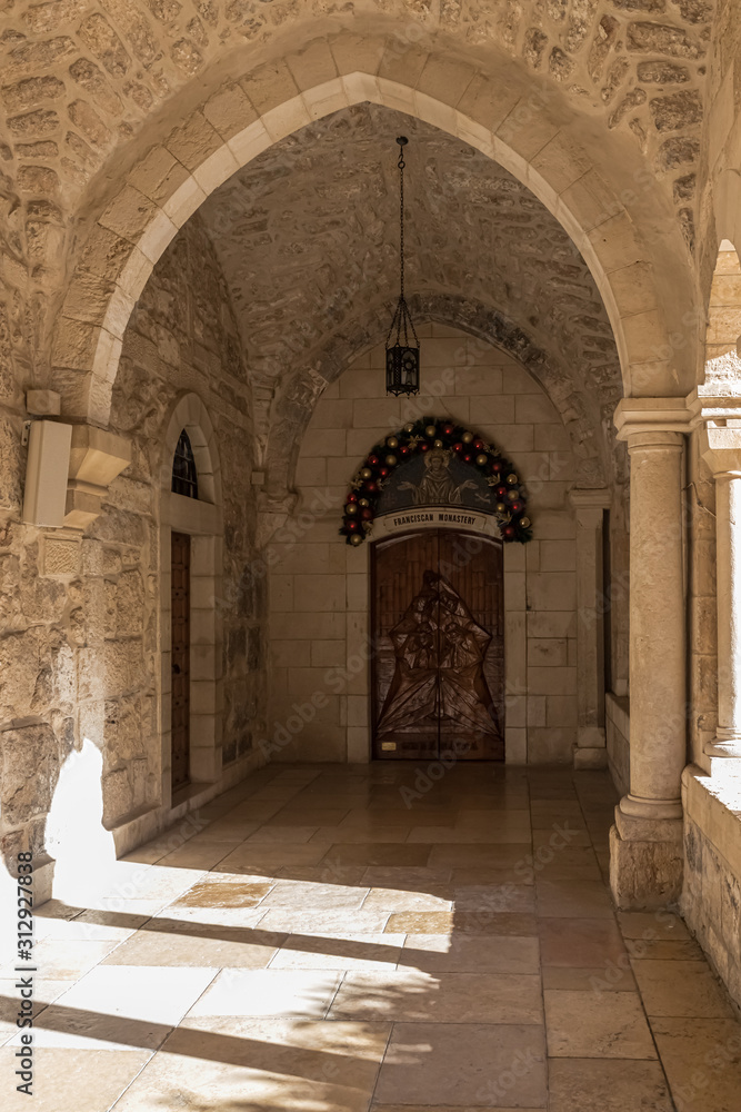 Side entrance to the Franciscan monastery on the side of the Chapel of Saint Catherine in Bethlehem in Palestine