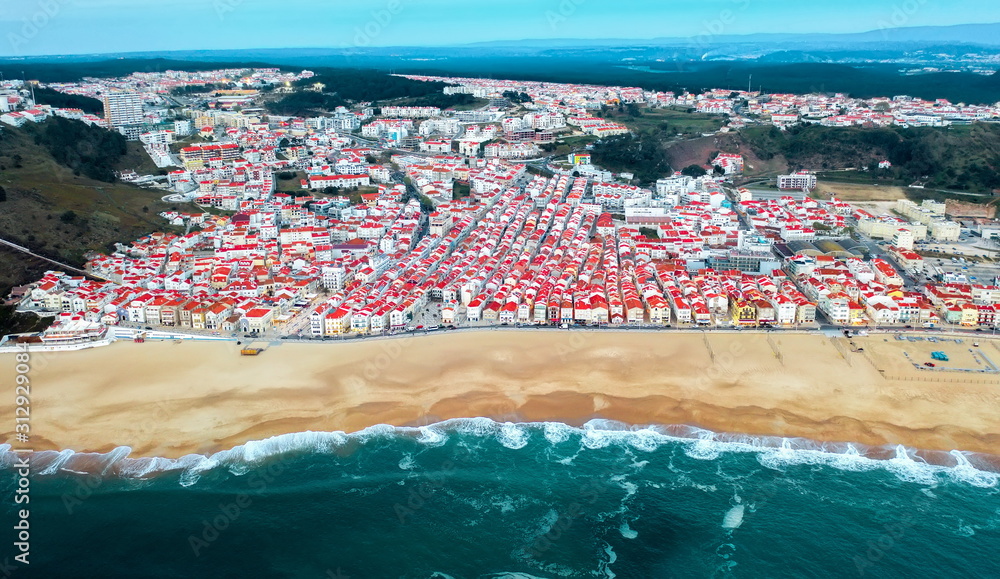 Nazare, Portugal - 30 september: aerial panorama view resort town ocean and city beach, summer