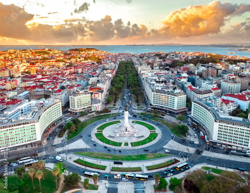 Lisbon aerial skyline panorama european city view on marques pombal square monument, sunset outside crossroads portugal