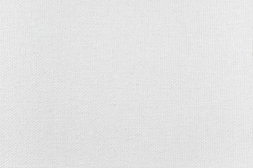 Close-up white canvas texture. Student grade blank painting canvas.