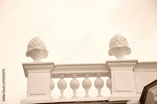 decorative elements on the roof of the building. old style photo.