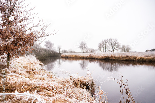 winter landscape with river...