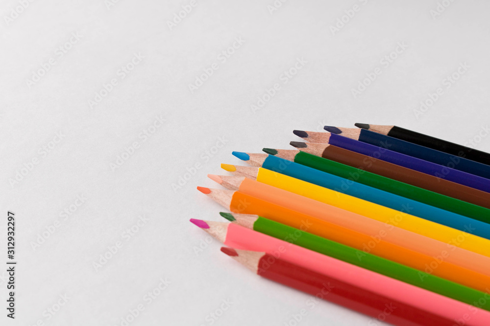 A set of colored pencils. Isolated on white background. Selective focus. A set of colored pencils. Isolated on white background. Selective focus.