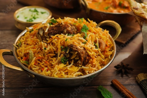 Indian meal / Restaurant menu concept - Mutton biryani, butter chicken, Roti