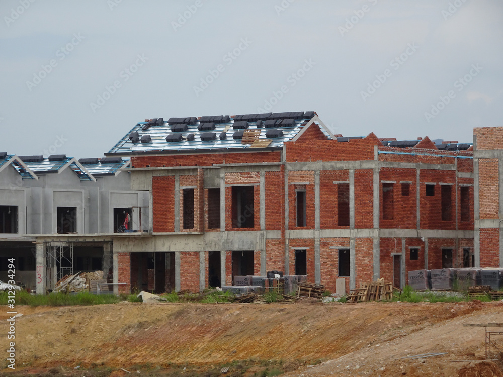 Double story luxury terrace house under construction in Malaysia.  Designed by an architect with a modern and contemporary style. 