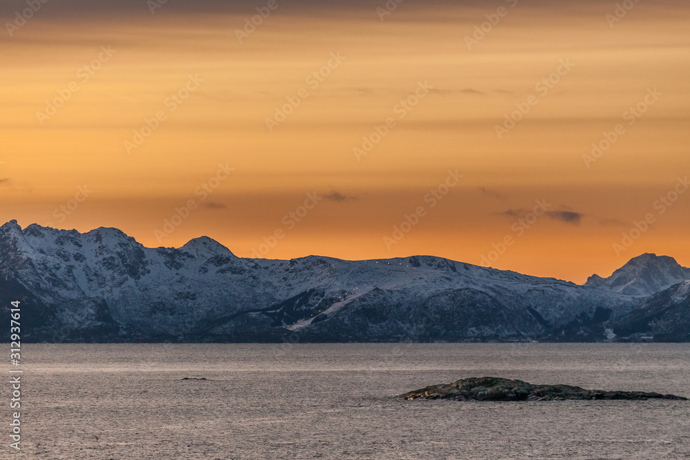 Amazing Sunset over Lofoten island, Norway. Dramatic winter landscape